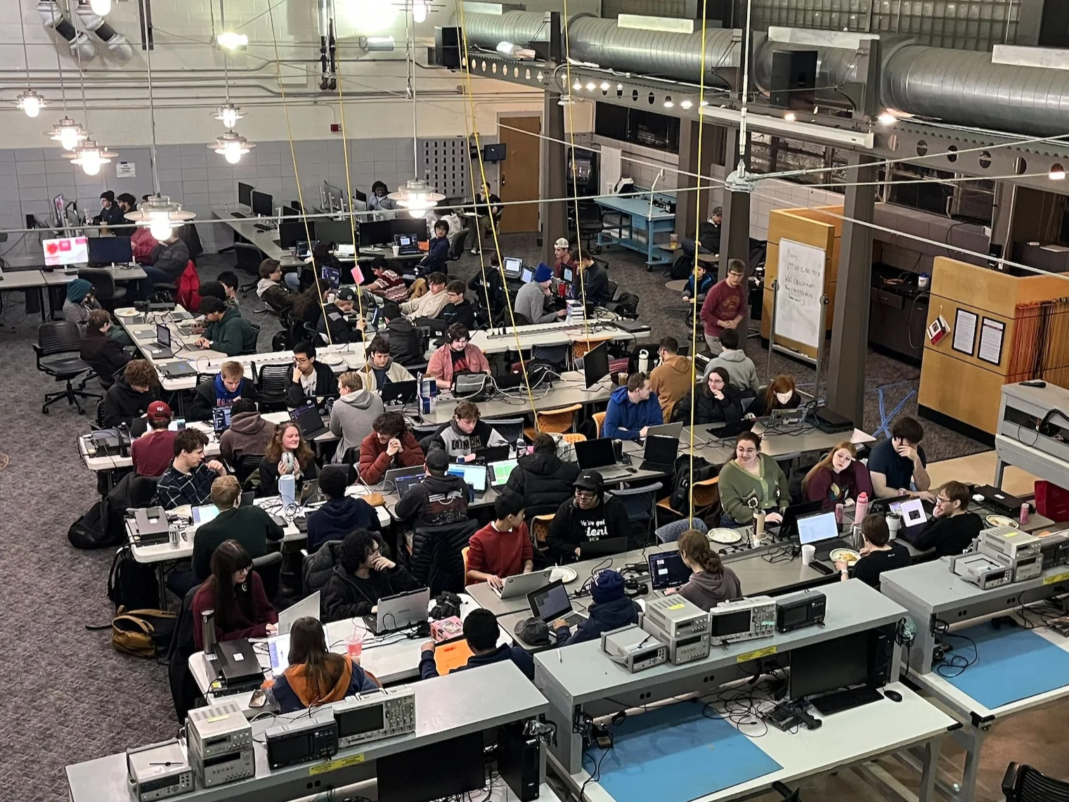 Participants collaborating at a cyber defense competition